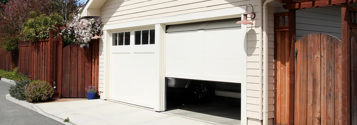 Fix Metal Garage Door Jerking in Naperville, Illinois